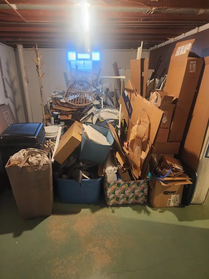 Roll-off dumpster container at job site for 20 Yard Dumpster Rental in The Village